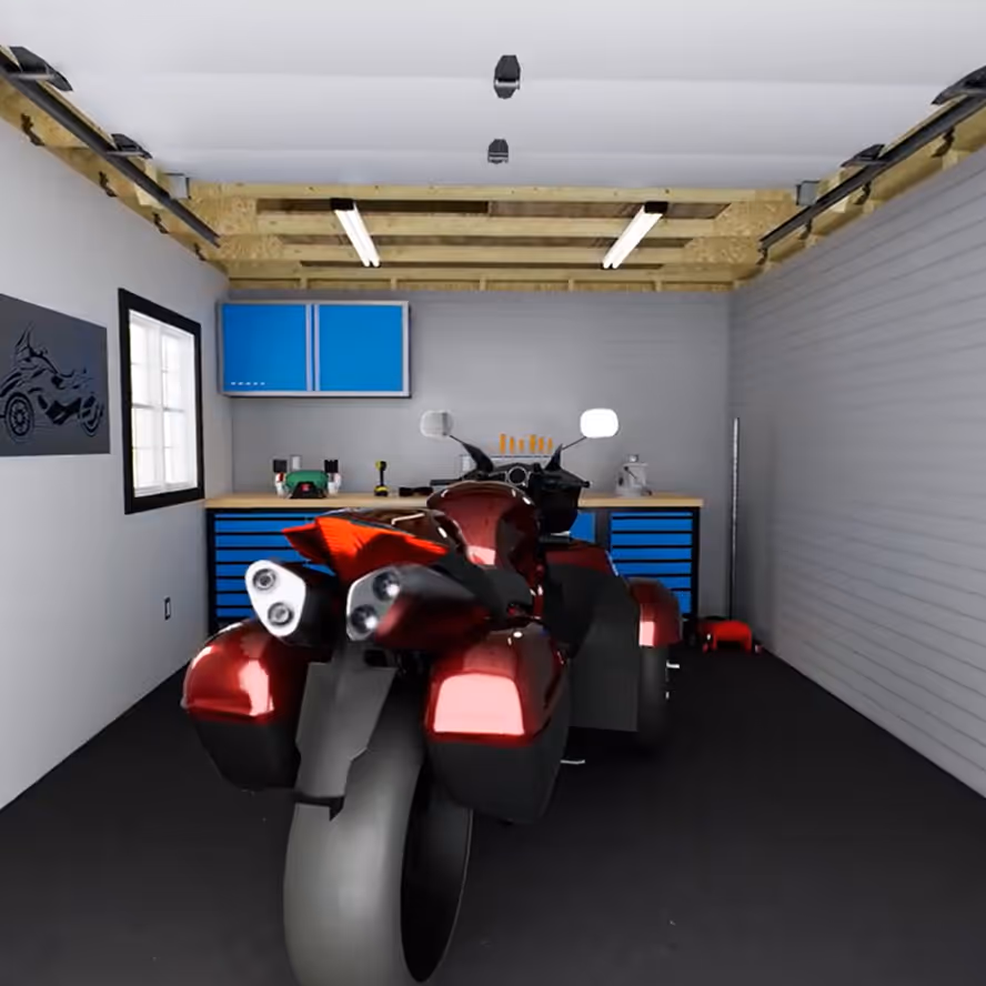 A motorcycle on a lift inside a Tailored Titan garage build