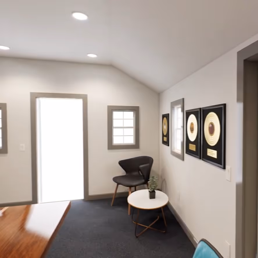 The seating and acoustic panelling of the podcast studio build